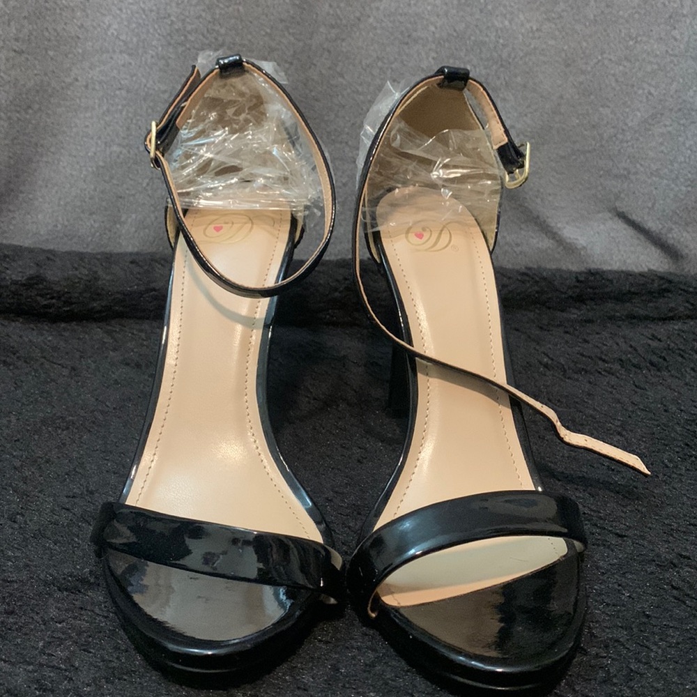 Glossy black heels